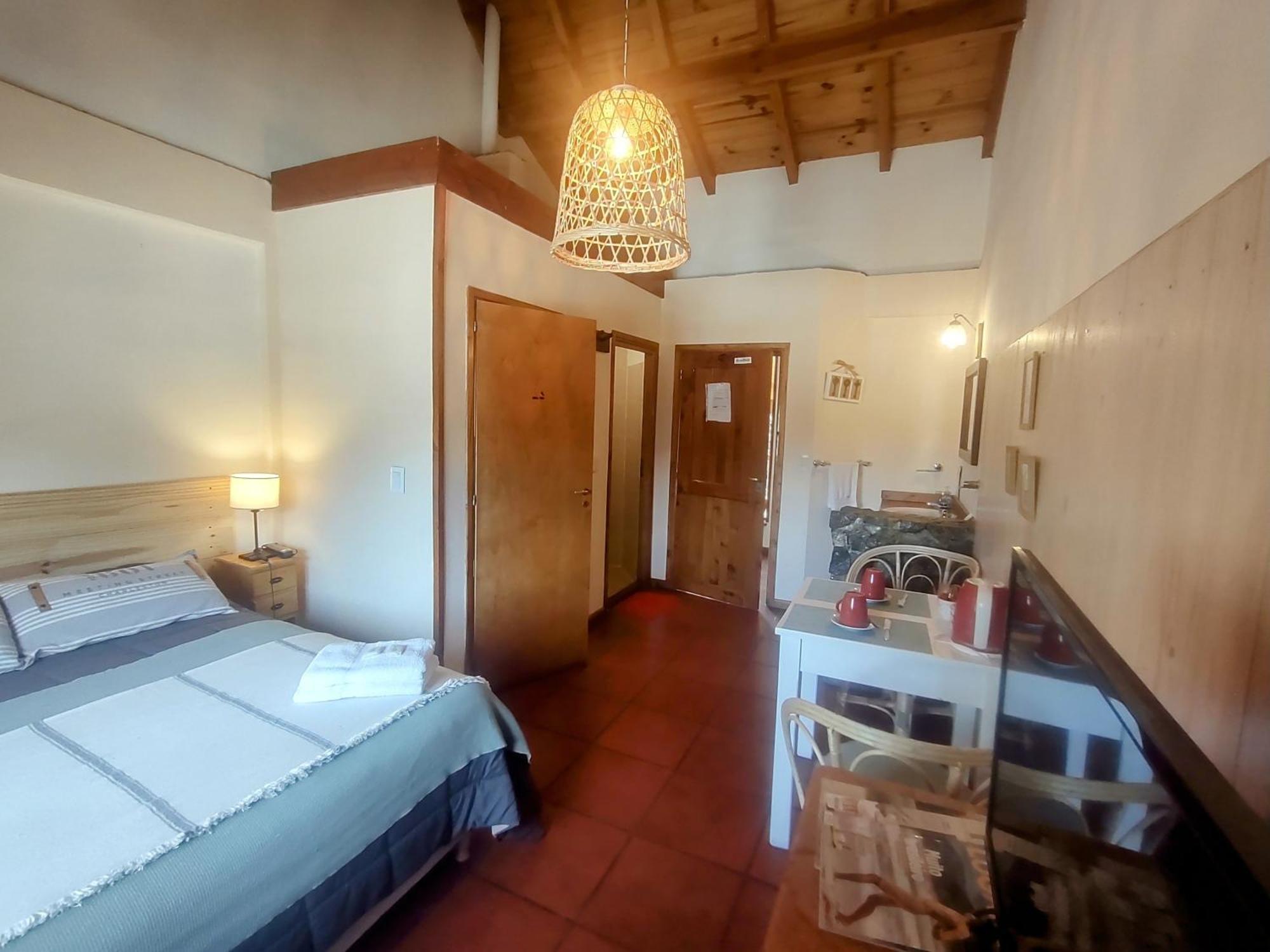 Hostería Bajo Cero Villa La Angostura Quarto foto